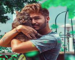 He is an animal lover especially a cat lover and has a pet cat.